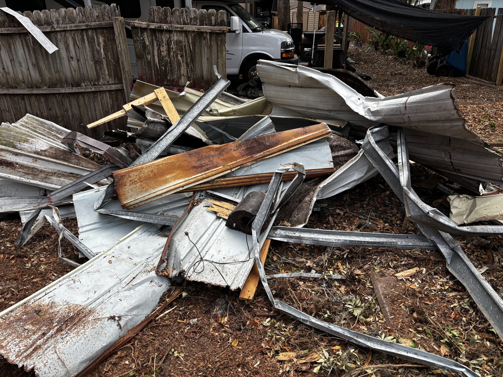 Metal roofing and siding debris pile