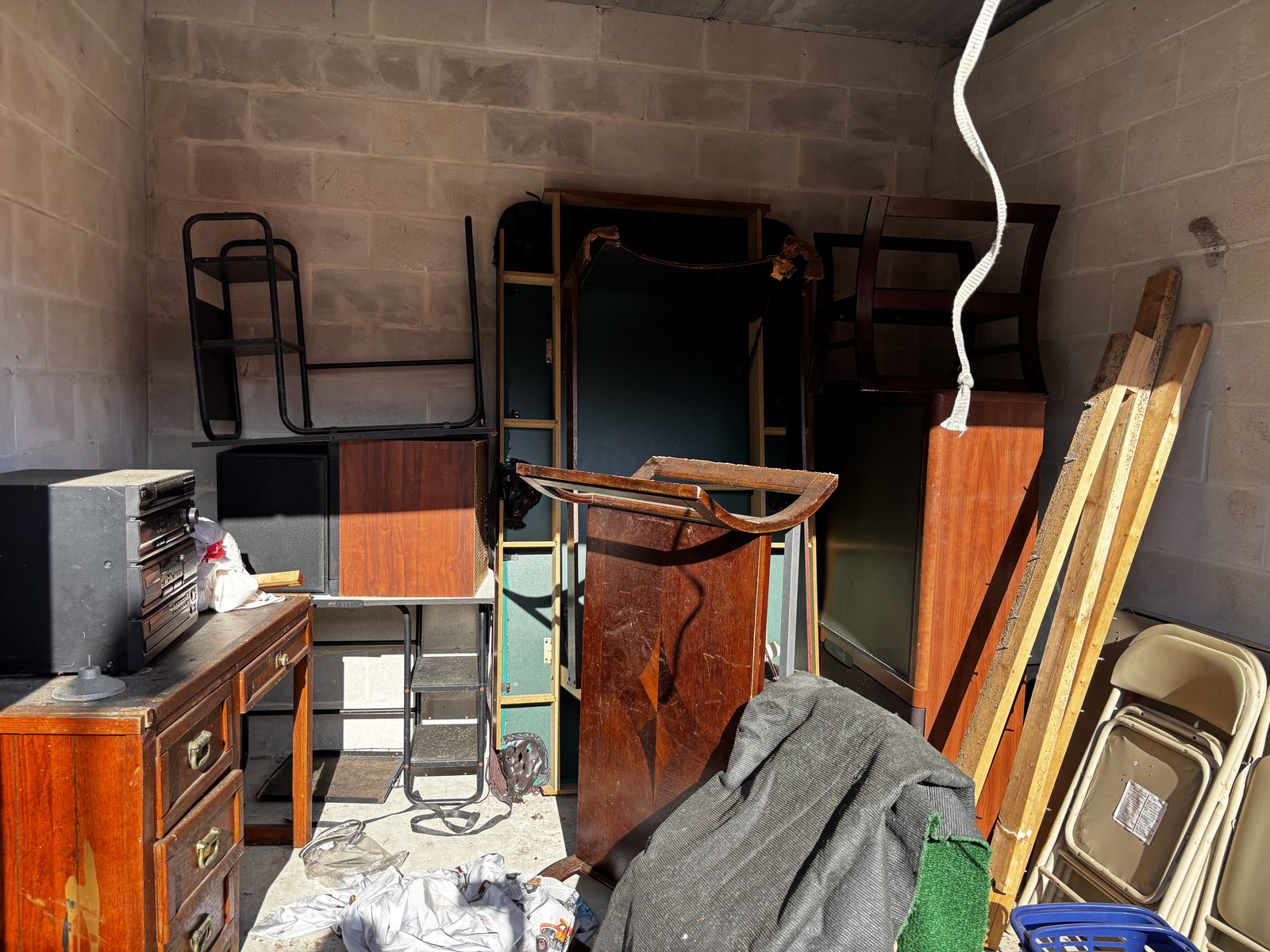 Storage unit interior with furniture and electronics