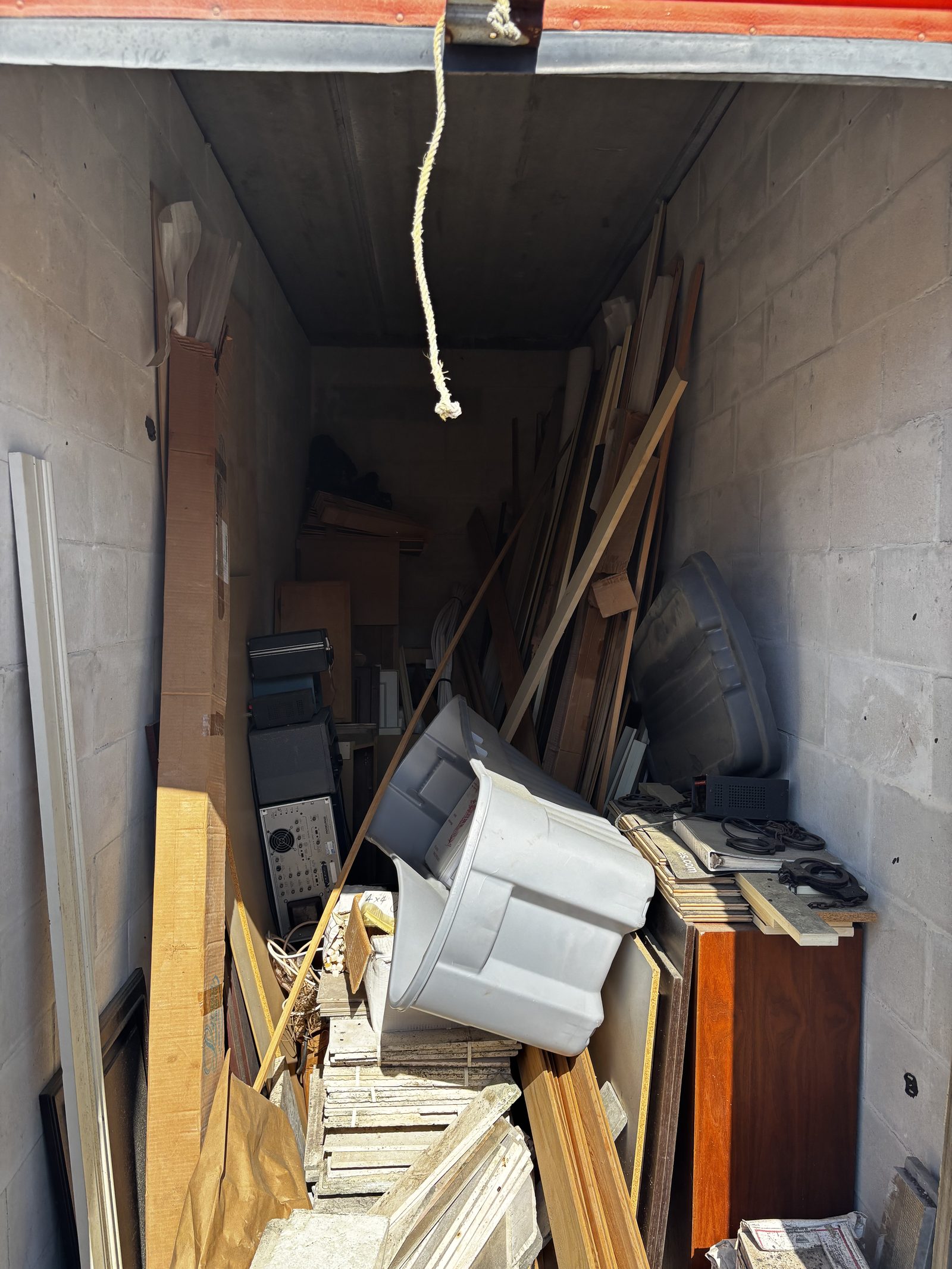 Packed storage unit interior cleanout