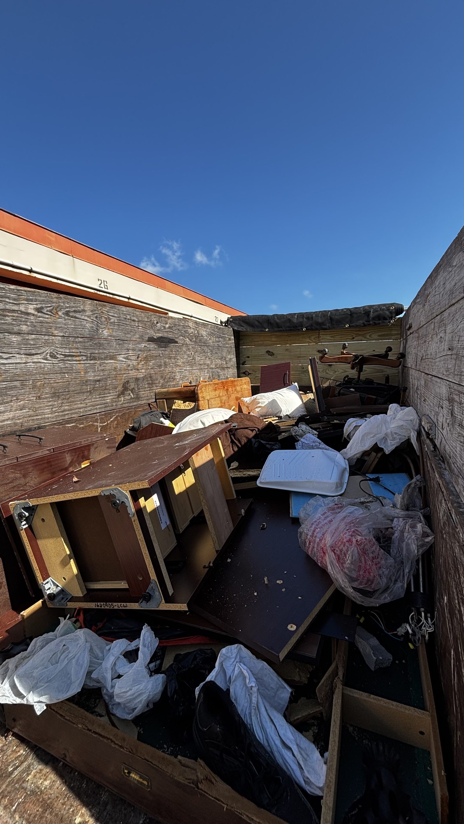 Trailer loaded with furniture debris